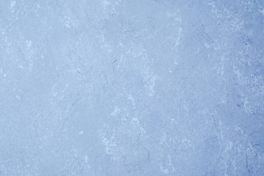 Yumuşak soluk desenli mavi duvar ve klasik yüzey kaplaması