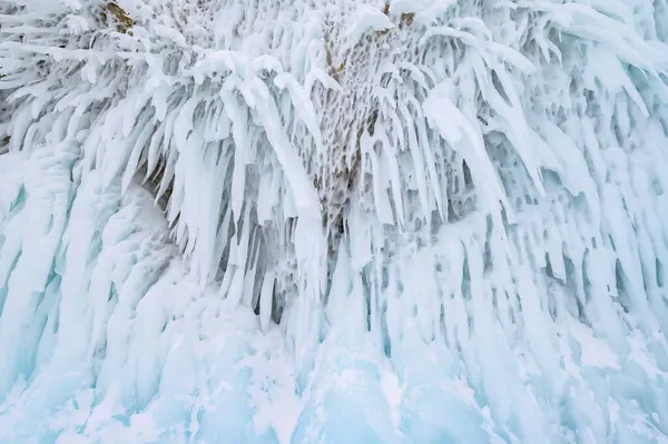 Beautiful landscape of an ice formation such as Ice spike and Icicle forming in a temperature below 0 C in lake Baikal, Russia. The water in Lake Baikal freezes in bizarre shapes in winter season.