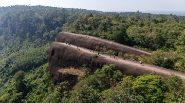 Aerial view of an iconic Three Whales Rock (in Thai called Hin Sam Wan) a 75-million-year-old rock formation protruding out of a mountain in Phou Sing, Bueng Kan Province, Thailand. clipart