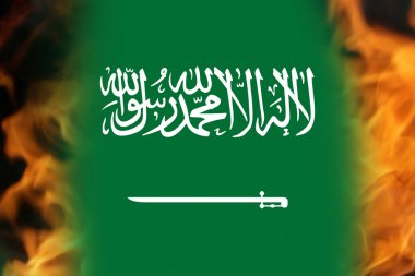 Suudi Arabistan bayrağının arka planından çık. Ateş ve alev. İran ve Suudi Arabistan arasındaki savaş. Suudi Arabistan devrimi. Odaklanamıyorum.