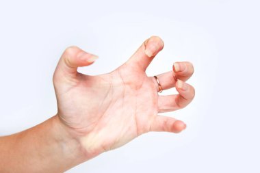 Woman hand in claw gesture on a white isolated background. Angry and aggressive. clipart