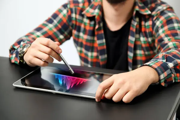 Business man using tablet with holographic graphs and stock market statistics gain profits. Man working with digital tablet computer. Business strategy. Digital marketing.