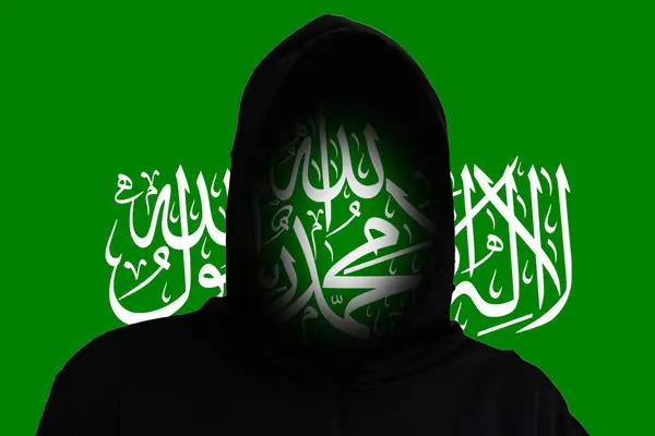 Flag Hamas geçmişinde kılık değiştirmiş bir terörist. İsrail ve Filistin arasındaki Hamas. İsrail Filistin savaşı. Ortadoğu 'da dünya krizi. İsyan. İsyancı terörist gerilla konsepti.