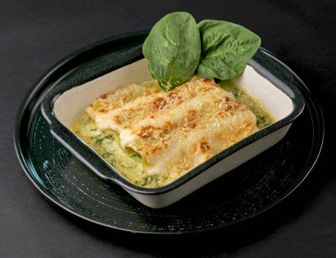 Lasagna with spinach. Homemade Italian lasagna with spinach chicken.