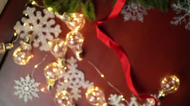 Old box with Christmas toys - golden deer, colorful balls, and tinsel. Old box with Christmas toys - golden deer, colorful balls, and tinsel