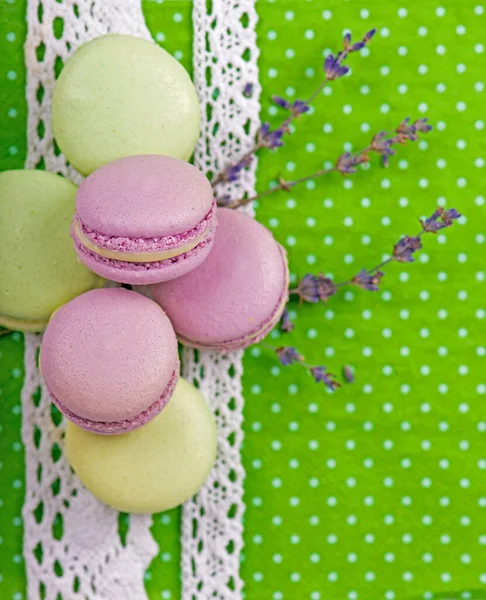 Macaroon on green background, vintage color tone