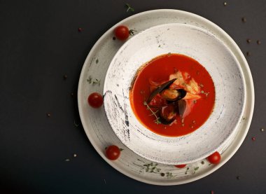 Bouillabaisse soup with shrimps, calm and fish snapper