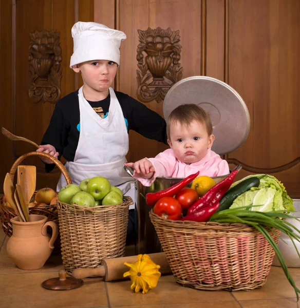 Portrait Smiling Babys Sitting Large Cooking Stock Pot Surrounded Vegetables — Stock Photo, Image