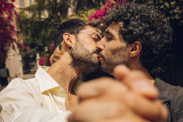 stock image Happy gay couple hugging in the park. LGBT gay couple concept.