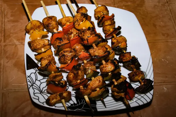 Yummy barbecue have a good meal. Cooking a group of Brochettes on a Barbecue. BBQ with beef and vegetables