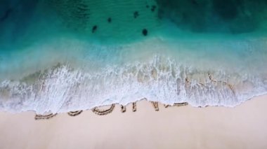 business _ online letter written on the beach sand and silded with a wave, and revees a new letter concept video