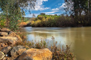 Jordan river stream clear blue sky