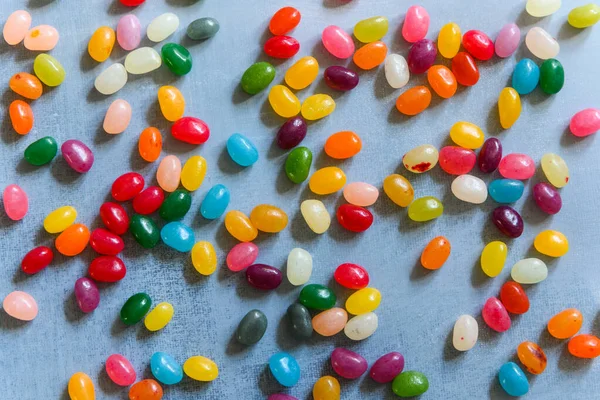 Grande Pile Bonbons Gelée Très Colorés Étalés Sur Fond Gris Image En Vente