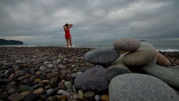 Woman Stands Shore Pebble Beach Sea — Stock videók
