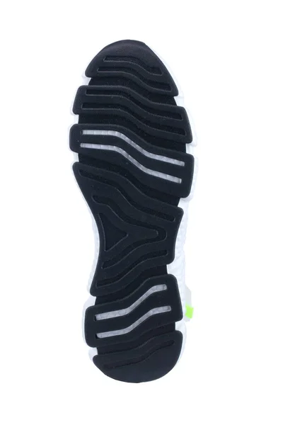 Zwarte Rubberen Zool Van Sneaker Met Witte Inzetstukken Geïsoleerd — Stockfoto