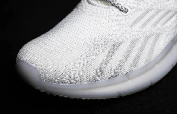 Bagian Dari Sneaker Kain Putih Pada Latar Belakang Gelap — Stok Foto