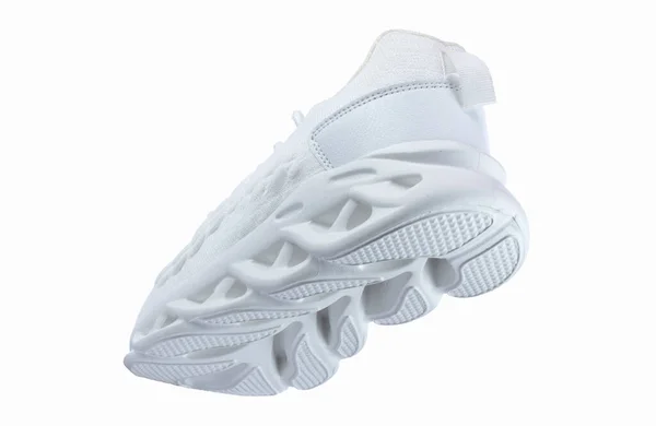 Witte Sportschoenen Met Gegolfde Zolen Een Witte Achtergrond — Stockfoto