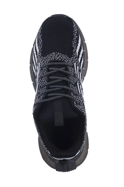 白色背景上的黑色抹布运动鞋 — 图库照片