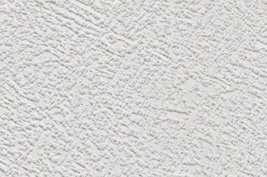 Soyut lekeli kağıt duvar kağıdının beyaz dokusu. Alçılı kabartmalı duvar.