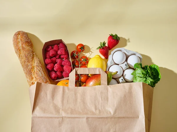 stock image Full paper grocery bag with healthy products. Organic food concept, copy space