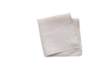 Üst manzara bej gri keten mutfak peçetesi beyaz arka planda izole edilmiş. Model için katlanmış kumaş