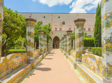 Naples, ITA - June 03, 2024: Alley in World famous Majolica cloister in Naples, Italy clipart