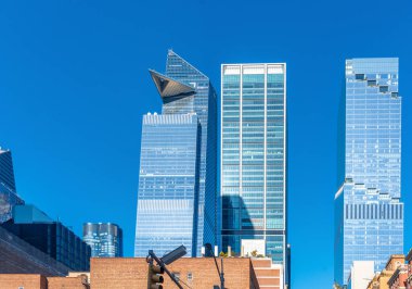 Güneşli bir sabahta Manhattan 'da modern gökdelenler. New York City, ABD