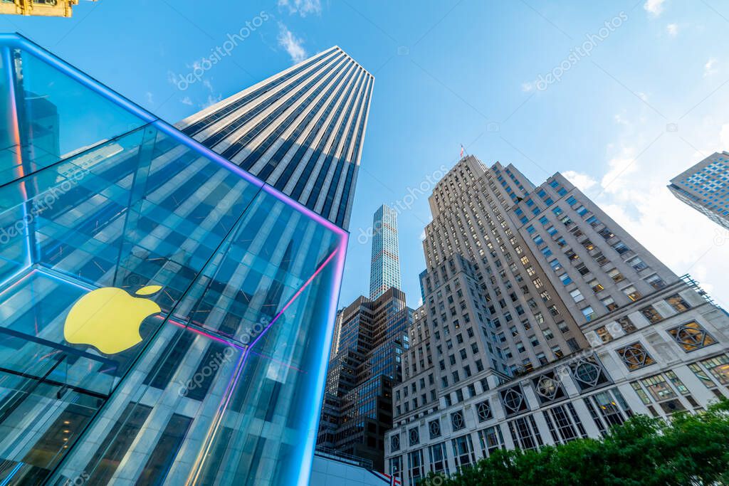 New York, USA - October 07, 2024: Famous Apple Store in 5th Avenue under a blue sky
