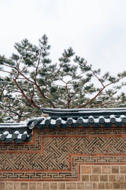 Deoksugung Palace Korean traditional wall with snow at winter in Seoul, Korea