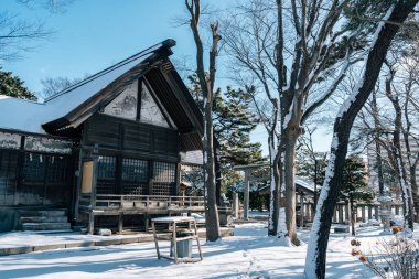 Hakodate, Hokkaido, Japan - February 11, 2024 : Toyokawa Inari Shrine at winter clipart