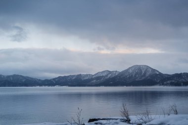 Lake Tazawa winter scenery in Akita, Japan clipart