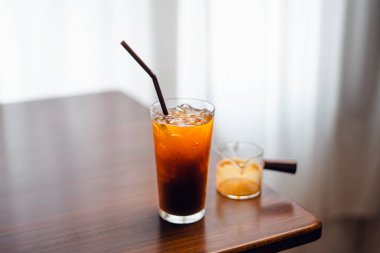 Iced coffee poured into a glass