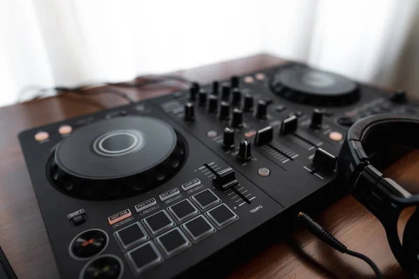 dj controller and Sound mixing desk at home,headphone