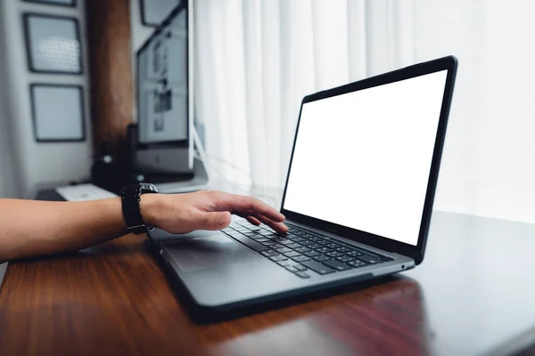 stock image hands working with blank screen laptop computer mock up