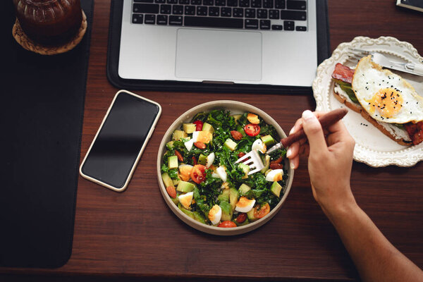 Healthy Avocado and Egg Salad on the desk