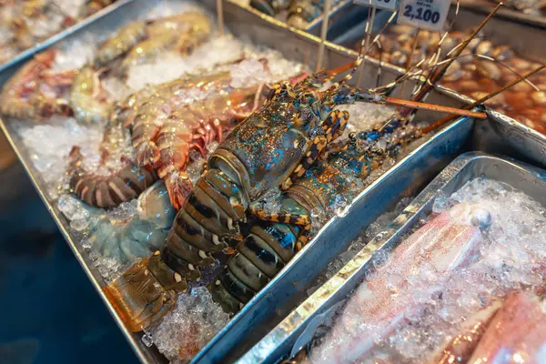 Fresh lobster for sale at a seafood restaurant in Thailand