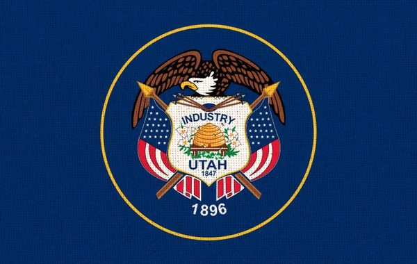 stock image Flag Of Utah. Flag of American state Utah. Symbol of Utah. American state. Fabric Texture