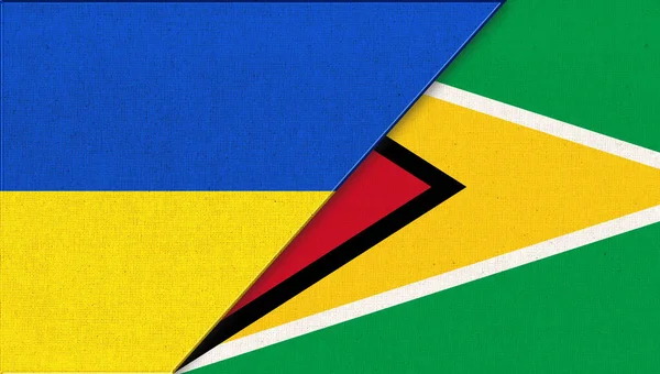 Ukrayna Guyana Bayrakları Kumaş Yüzeyinde Ukrayna Guyanian Bayrakları Var Ulusal — Stok fotoğraf