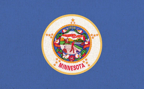 stock image Flag of American state Minnesota. Flags of the U.S. states Fabric Flag Minnesota. Symbol of Minnesota. American state. Fabric Texture, State symbol. American Territory