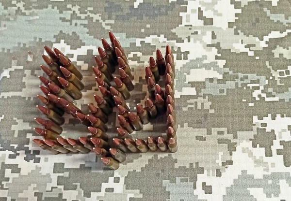 Coat Arms Ukraine Laid Out Cartridges Background Camouflage Clothing Cartridges — Stock Photo, Image