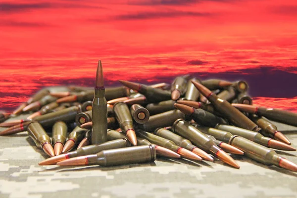 Pile Bullets Cloudy Sunset Military Concept Cartridges Automatic Weapons Background — Stock Photo, Image