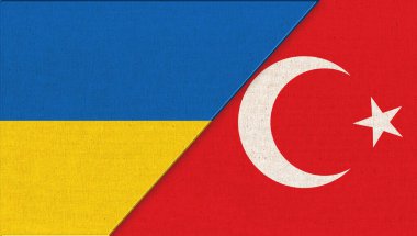 Ukrayna ve Türkiye bayrağı. Kumaş dokusunda Ukrayna ve Türk bayrakları. İki Bayrak Birlikte. Ukrayna ve Türkiye 'nin ulusal sembolleri. İki ülke arasındaki ilişkiler. Ukrayna ve Türkiye 'nin Dostluğu