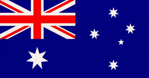 生地の表面にオーストラリアの旗 テクスチャの背景にオーストラリアの国旗 オーストラリア国旗 生地の質感 オーストラリア連邦 — ストック写真