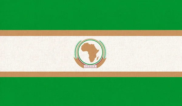 Flag of the African Union. flag of the Organization of African Unity. Flag of international organization. Fabric texture. political and economic union. AU