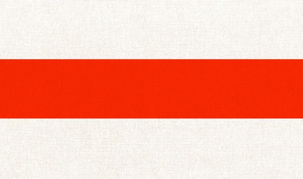 historical flag of Belarus. Flag of Belarus. Belorussian flag on fabric surface. National symbol of Belarusssians on patterned background. European country. dictatorship in Belarus