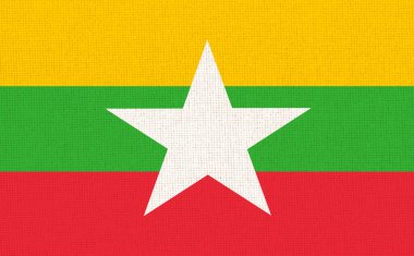 Kumaş yüzeyinde Myanmar bayrağı. Dokulu arka planda Burmar ulusal bayrağı. Burma eyalet bayrağı. Kumaş dokusu. Myanmar Birliği Cumhuriyeti. Asya ülkesi