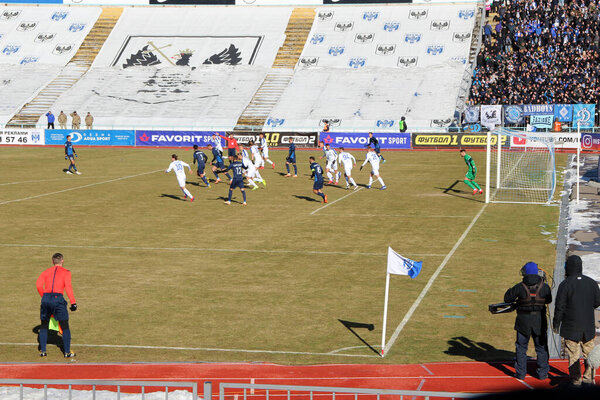 Chernihiv-Ukraine. 14 March 2020: Football teams Desna Chernihiv and Dynamo Kyiv play football match. Photo of game moment during football match. Corner while football game. Soccer players fighting for ball