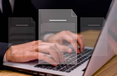 Evraksız işyeri, e-imza, elektronik imza, belge yönetimi Bir işadamı sanal bir defter ekranında dijital bir belgeye elektronik belge imzalar