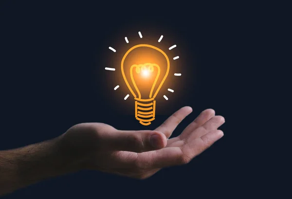 Innovation. Hands holding light bulb for Concept new idea concept with innovation and inspiration, innovative technology in science and communication concept,.