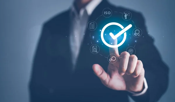 Quality management with Quality Assurance or QA and Quality Control or QC and improvement. Standardization, certification concept. Compliance to regulations and standards. Concept with manager.